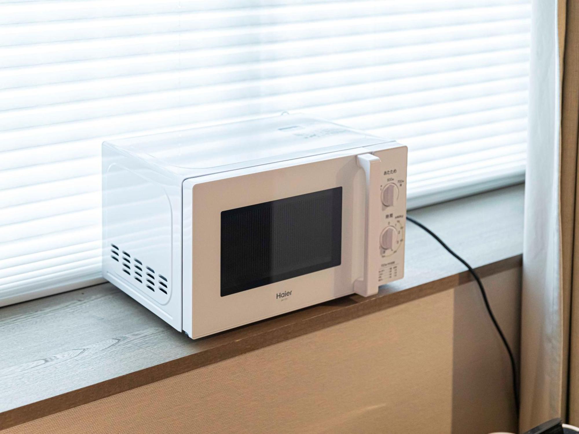 Good Nature Hotel Kyoto Kamer foto A microwave oven